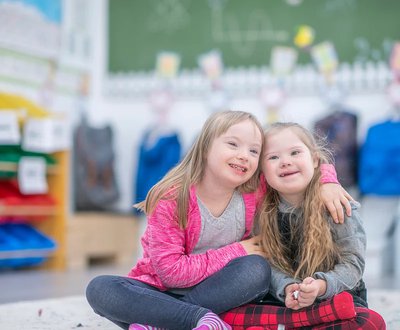 Two girls sitting